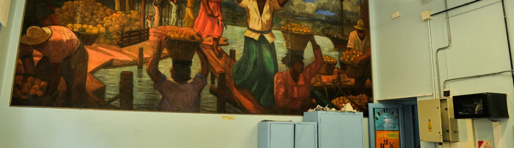 La escuela-museo que donó Quinquela Martín y que hoy recupera el color de sus murales